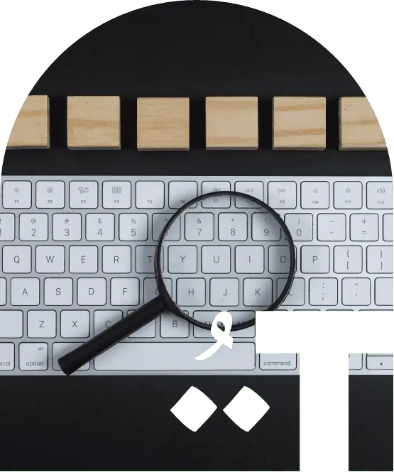 conceptual-research-with-keyboard-magnifier-wooden-cubes-black-desk-background-flat-lay-horizontal-image